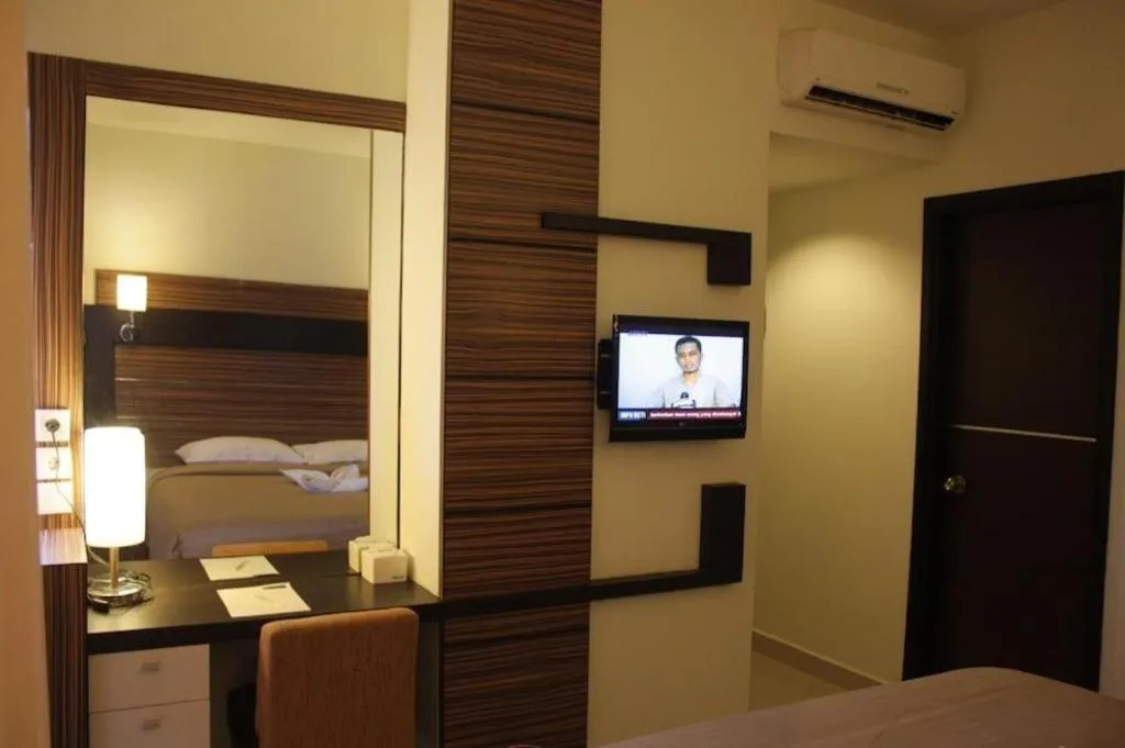 Bed in Travello Hotel Manado