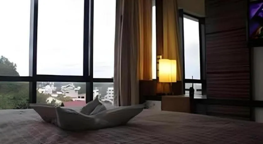 Bed in Travello Hotel Manado