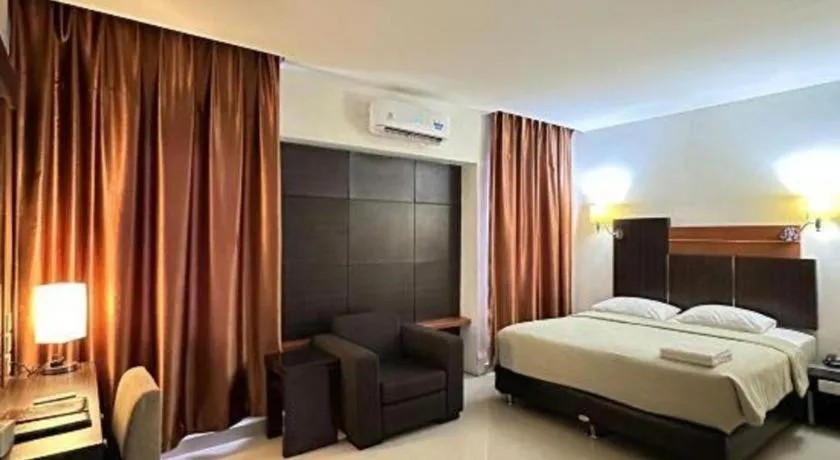 Bed in Travello Hotel Manado