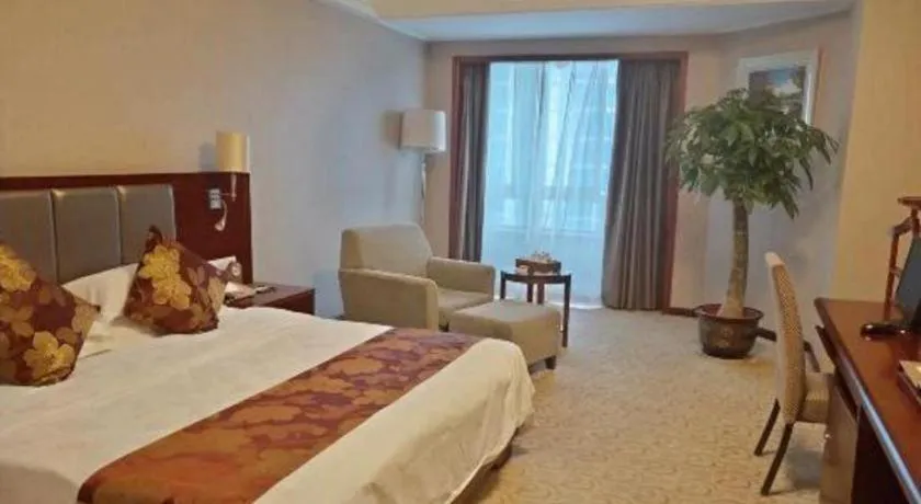 Bed in Fujian Galaxy Garden Hotel