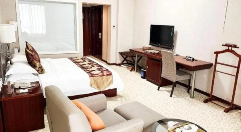 Bed in Fujian Galaxy Garden Hotel