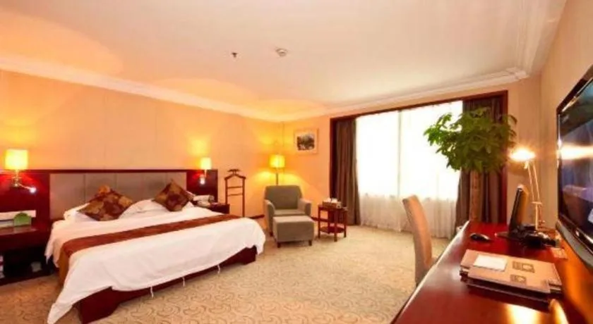 Bed in Fujian Galaxy Garden Hotel