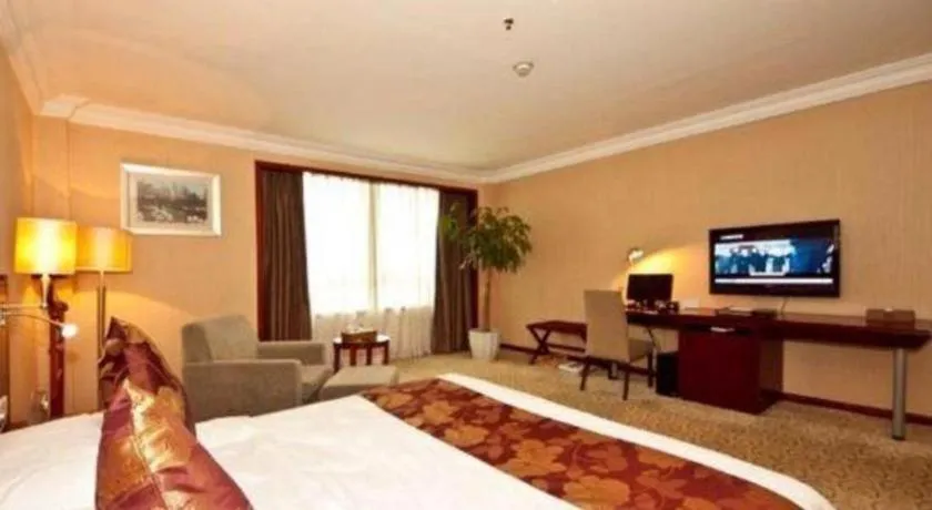 Bed in Fujian Galaxy Garden Hotel