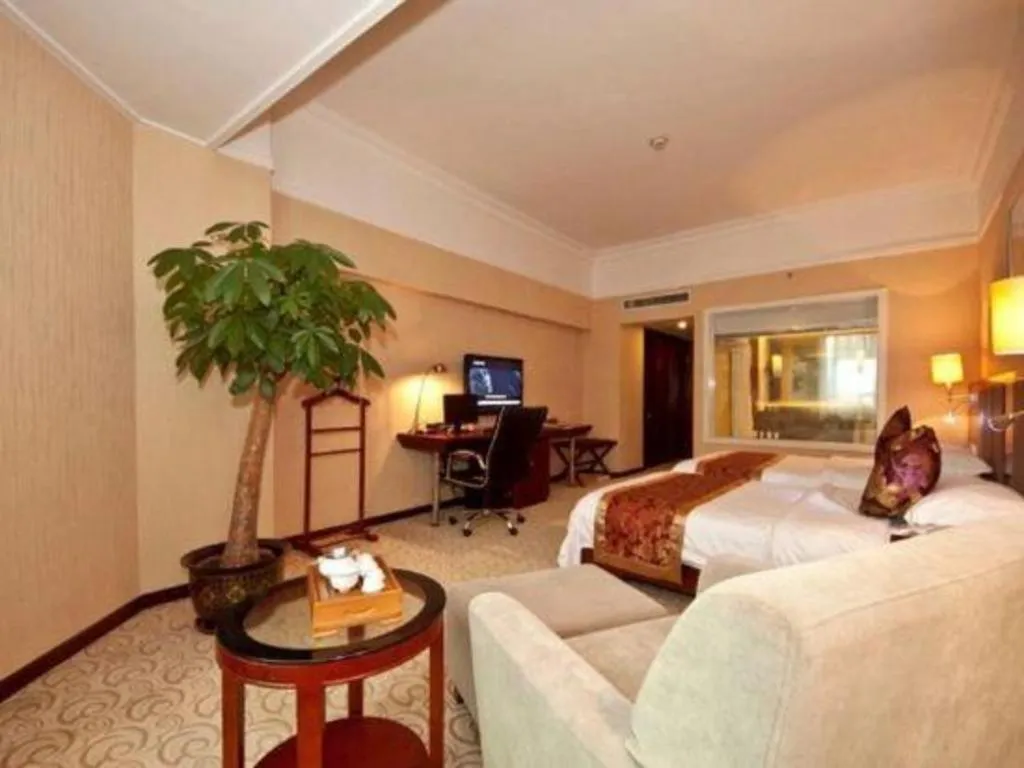 Bed in Fujian Galaxy Garden Hotel