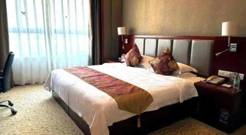Bed in Fujian Galaxy Garden Hotel