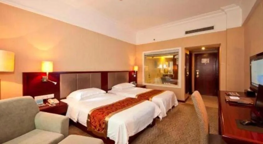 Bed in Fujian Galaxy Garden Hotel