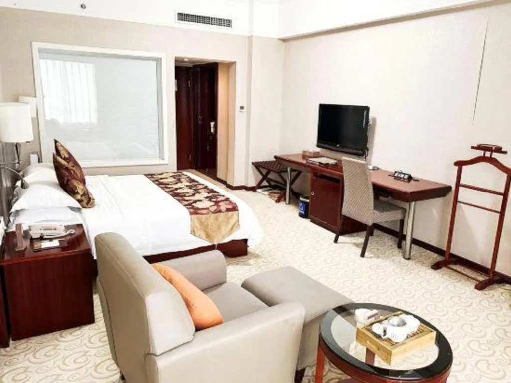 Bed in Fujian Galaxy Garden Hotel