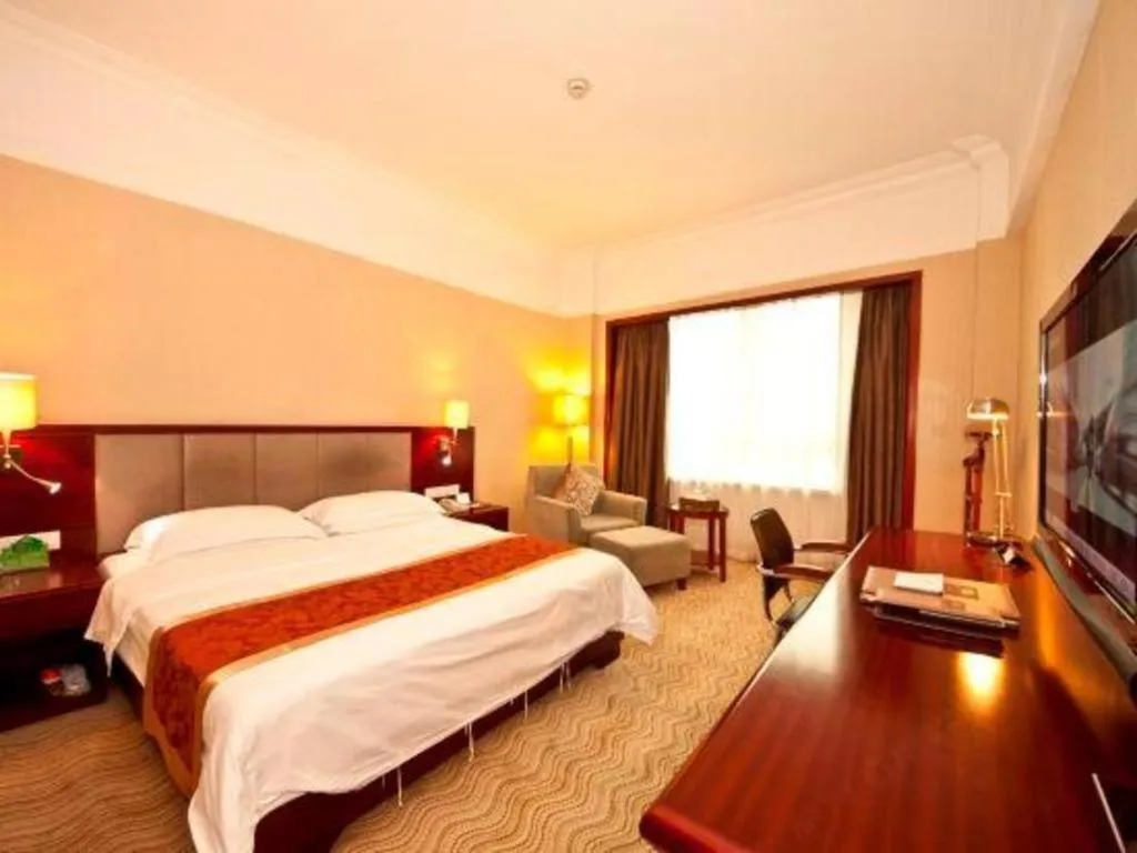 Bed in Fujian Galaxy Garden Hotel