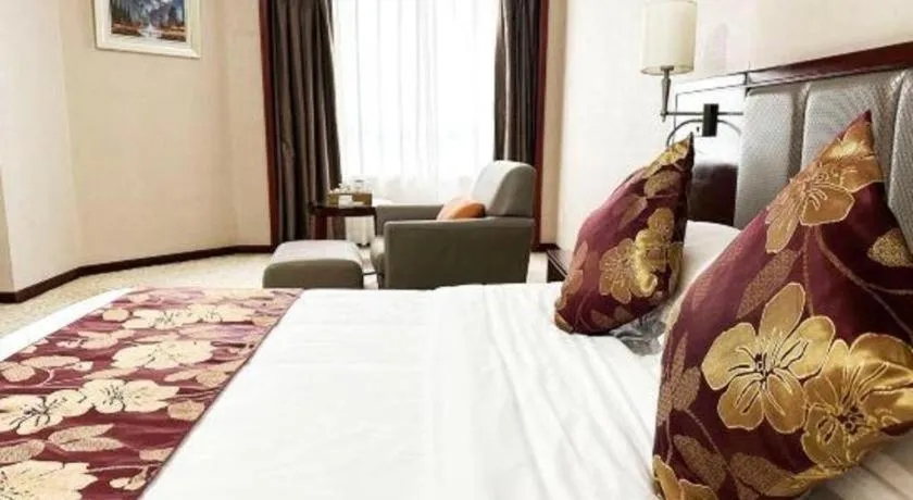 Bed in Fujian Galaxy Garden Hotel