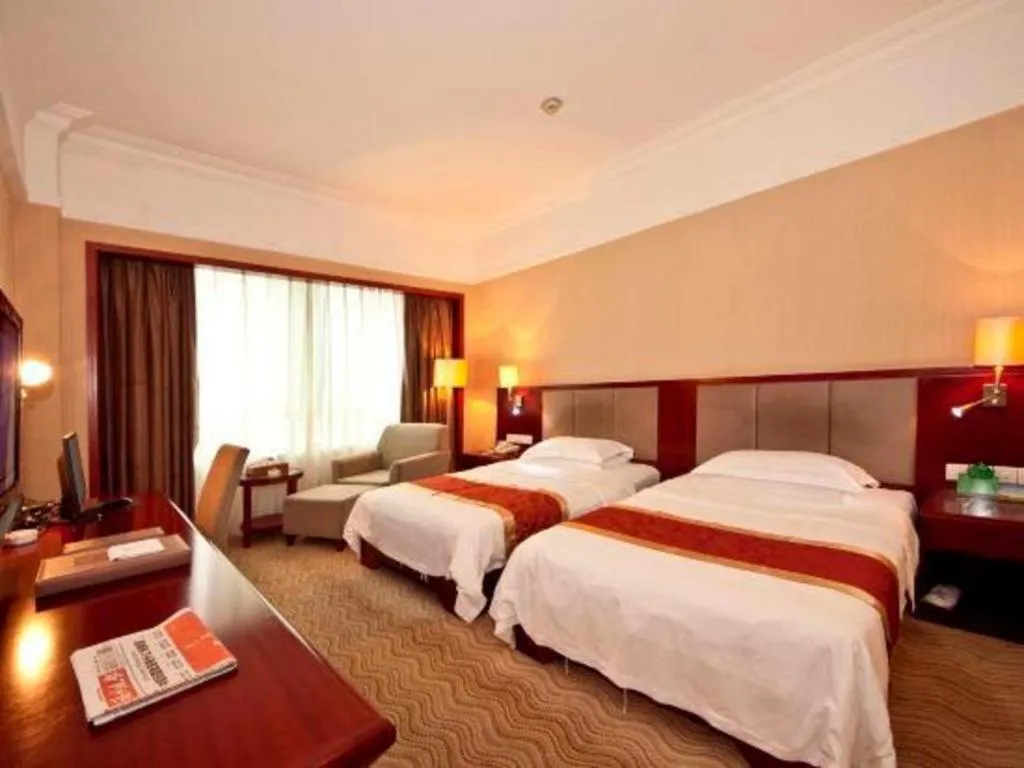 Bed in Fujian Galaxy Garden Hotel