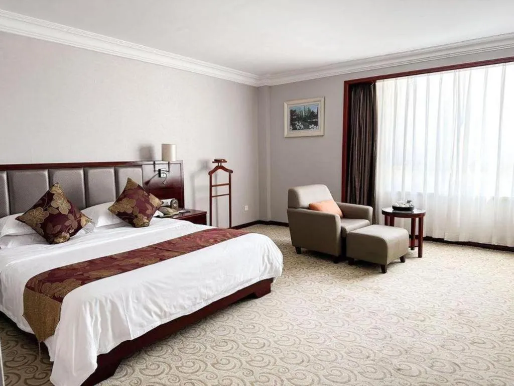 Bed in Fujian Galaxy Garden Hotel