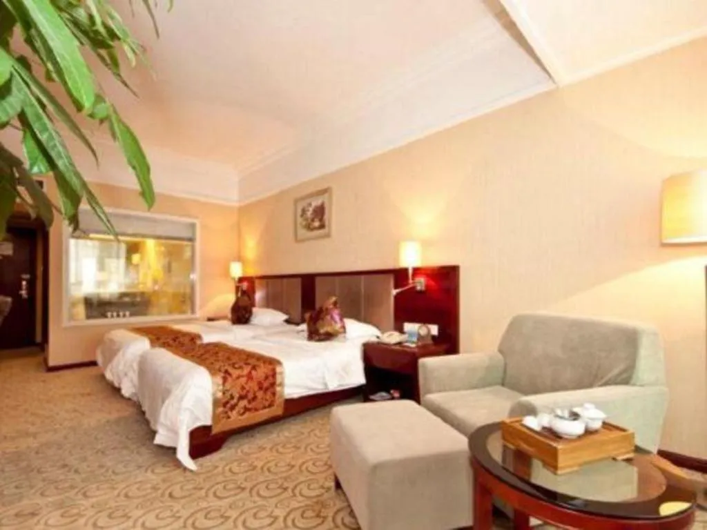 Bed in Fujian Galaxy Garden Hotel