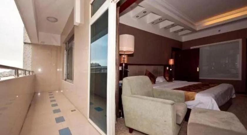 Bed in Fujian Galaxy Garden Hotel