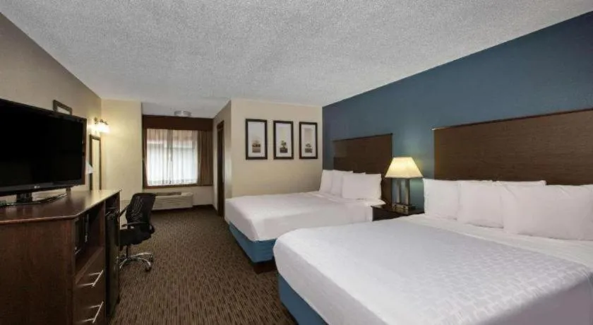 Bed in AmericInn by Wyndham La Crosse Riverfront-Conference Center