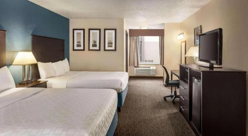 Bed in AmericInn by Wyndham La Crosse Riverfront-Conference Center