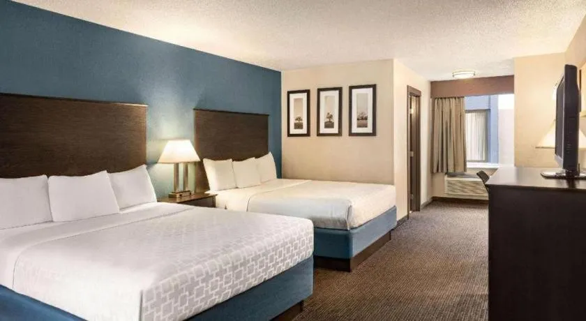Bed in AmericInn by Wyndham La Crosse Riverfront-Conference Center
