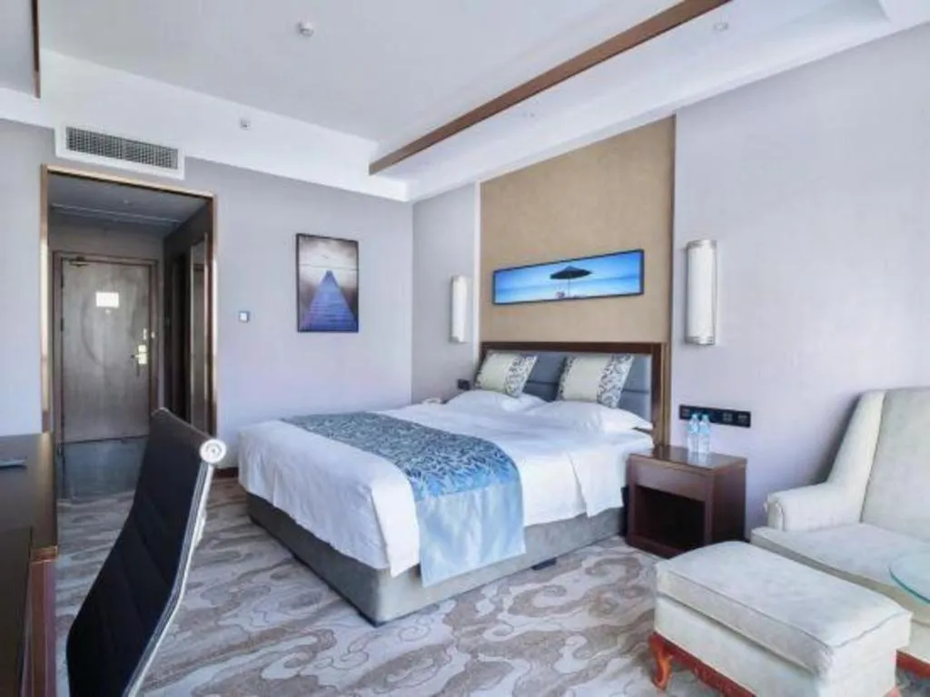 Bed in Dandong Rising Zhonglian Hotel