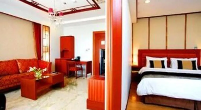 Bed in Amos Cozy Hotel Melawai