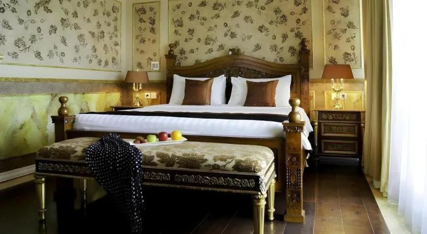 Bed in Amos Cozy Hotel Melawai