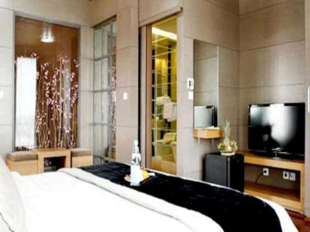 Bed in Amos Cozy Hotel Melawai