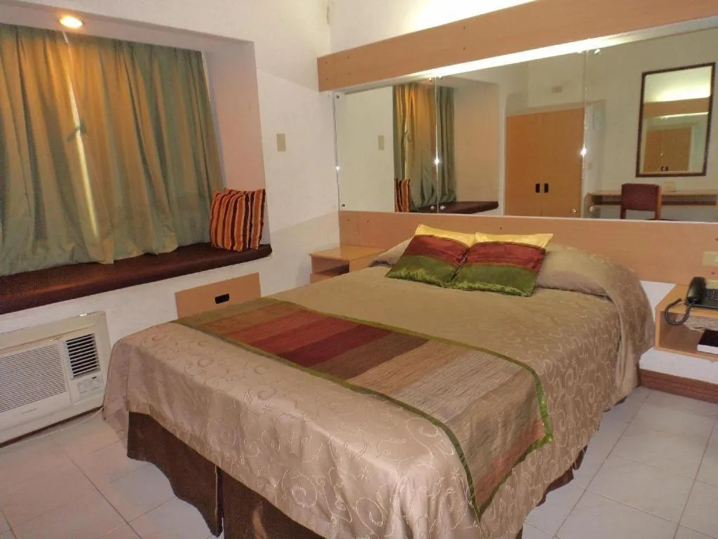 Bed in Filipiniana Hotel Calapan