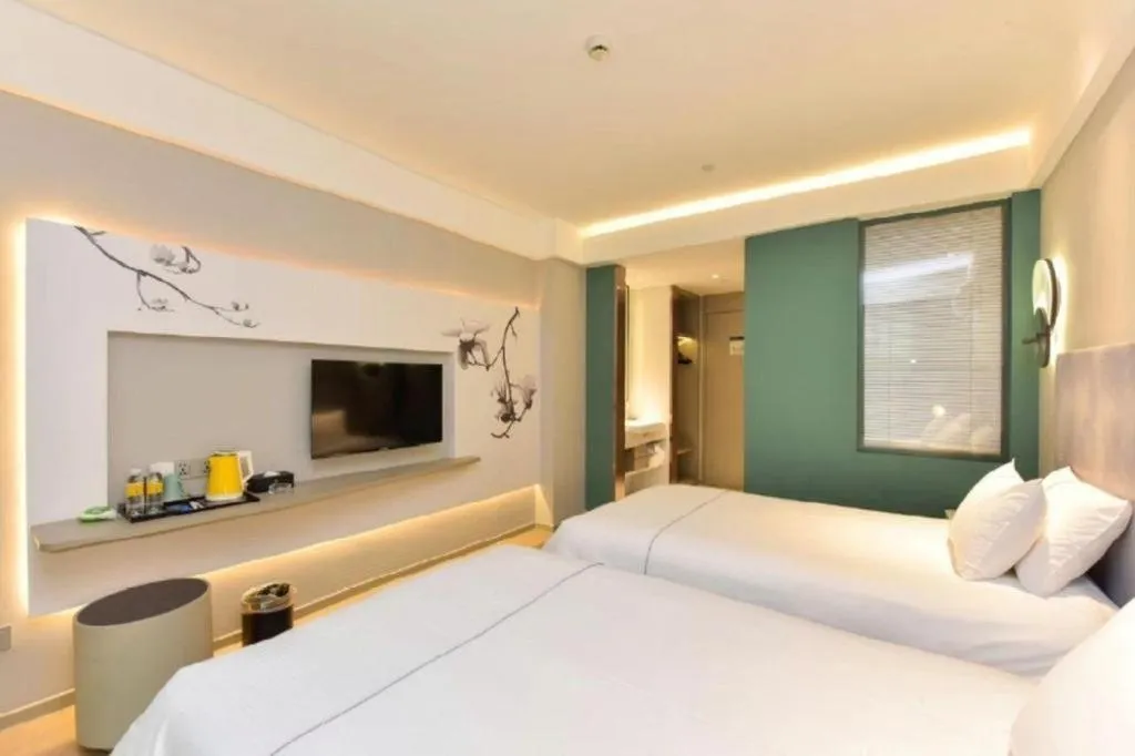 Bed in Magnotel Ningbo Tianyi Plaza Railway Station