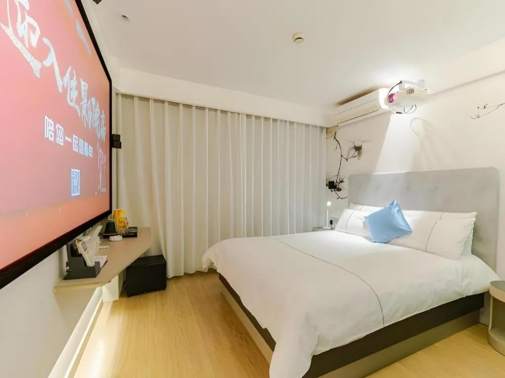 Bed in Magnotel Ningbo Tianyi Plaza Railway Station