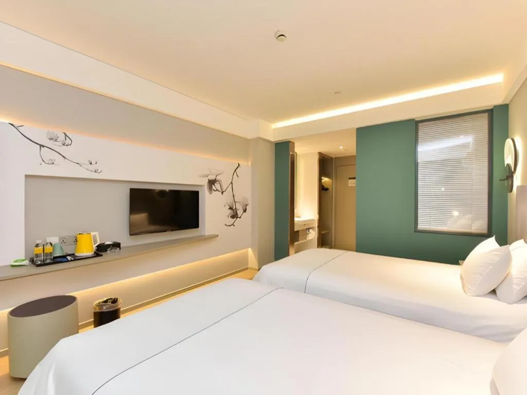 Bed in Magnotel Ningbo Tianyi Plaza Railway Station