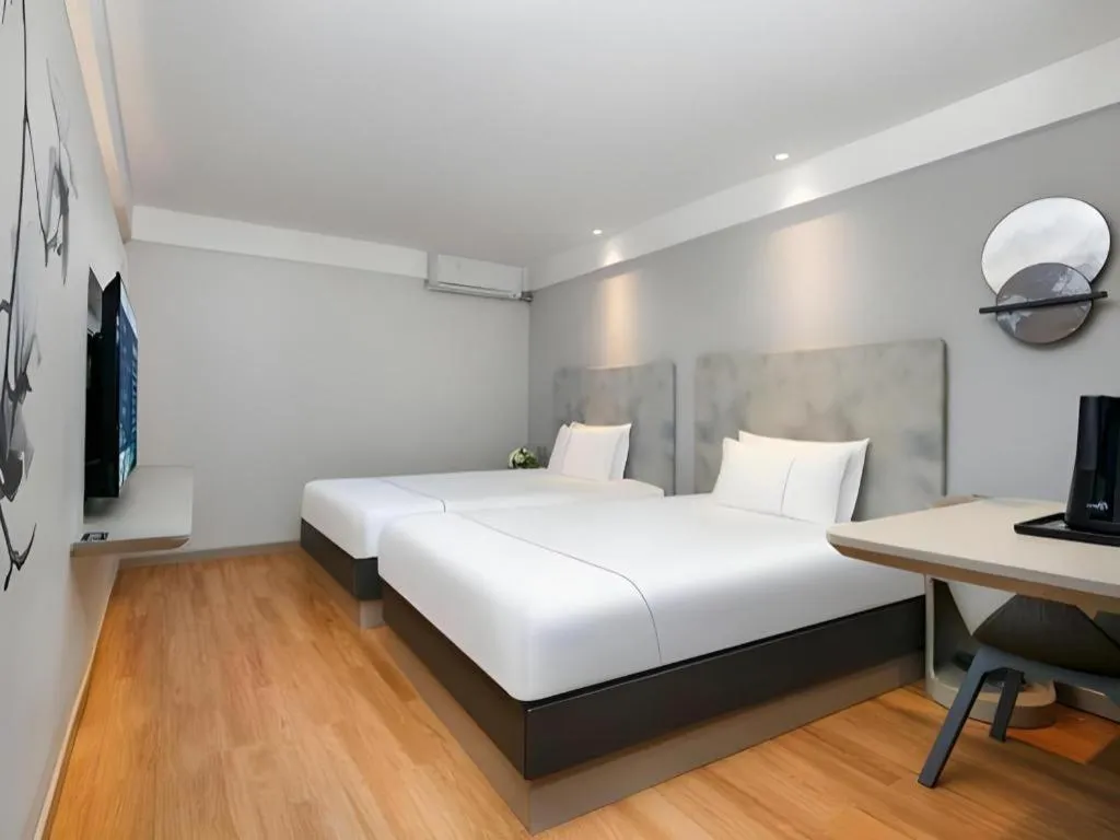 Bed in Magnotel Ningbo Tianyi Plaza Railway Station