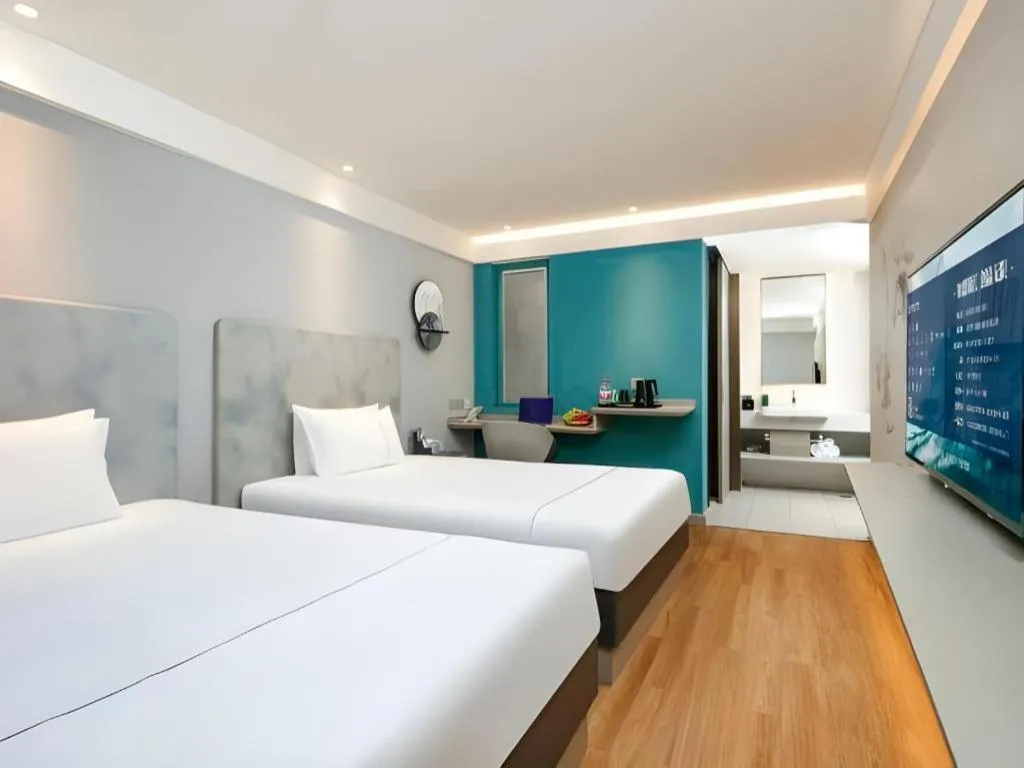 Bed in Magnotel Ningbo Tianyi Plaza Railway Station