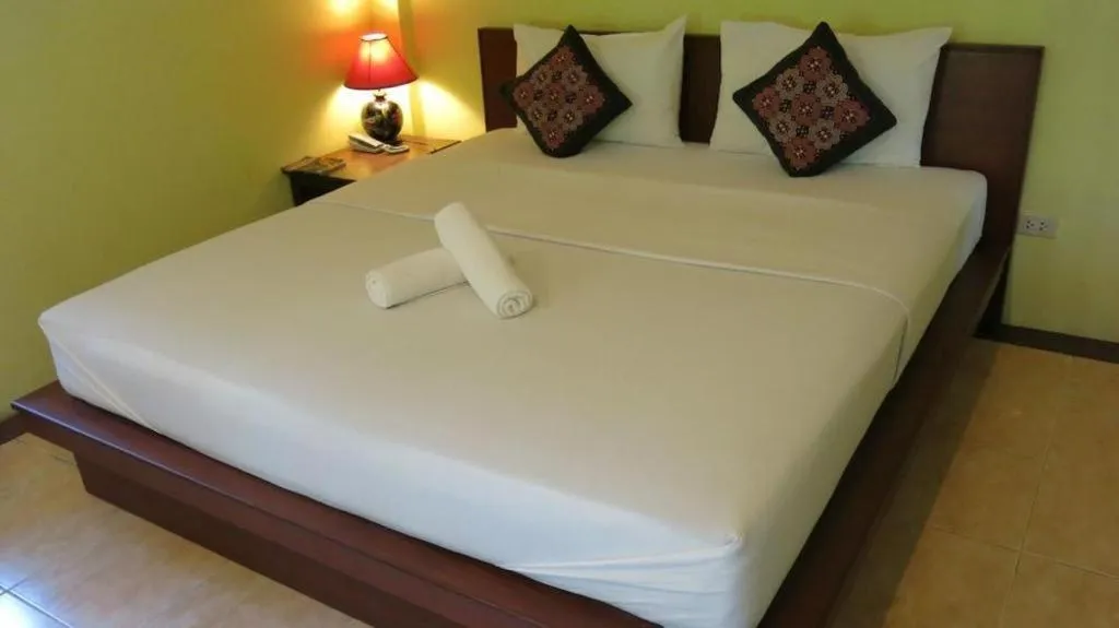 Bed in Baan Lapoon Hotel