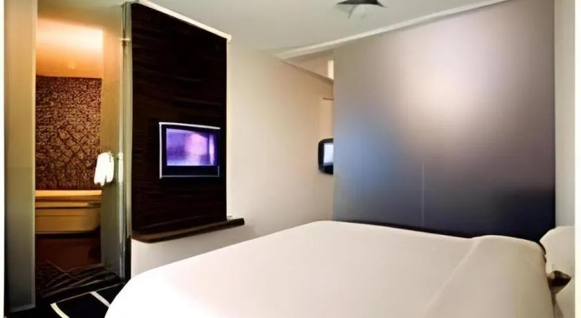 Bed in Orient Sunseed Hotel Airport Branch