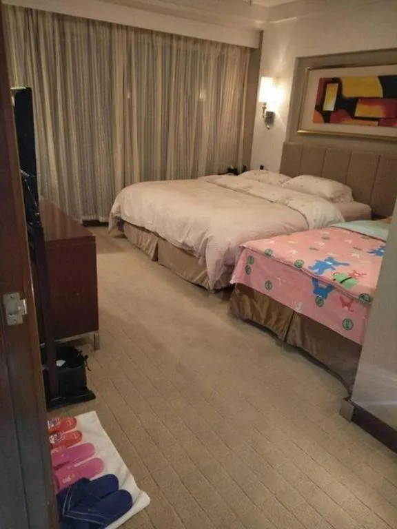 Bed in Jinan Blue Horizon Hotel Shizhong