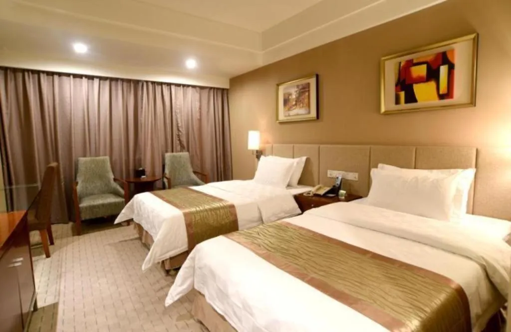 Bed in Jinan Blue Horizon Hotel Shizhong