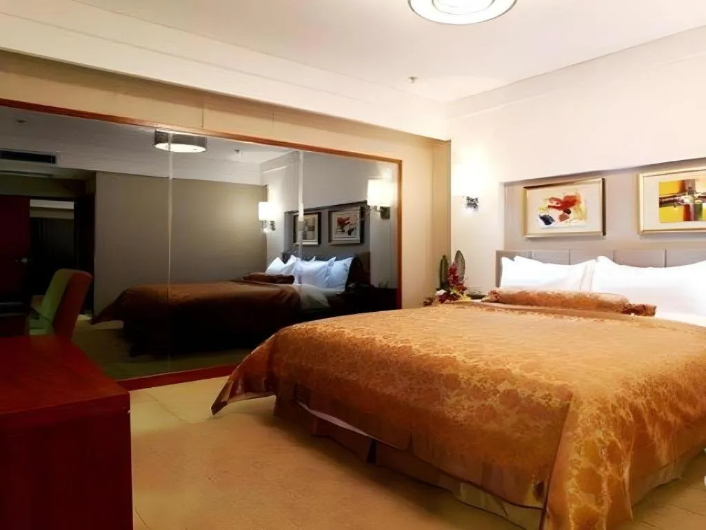 Bed in Jinan Blue Horizon Hotel Shizhong