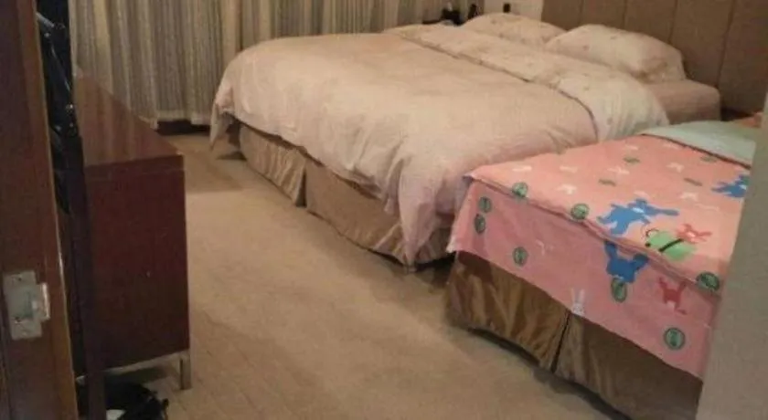 Bed in Jinan Blue Horizon Hotel Shizhong