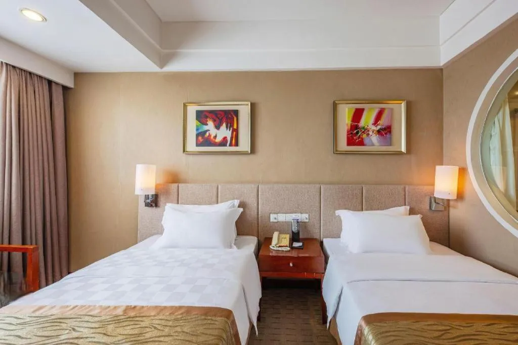 Bed in Jinan Blue Horizon Hotel Shizhong