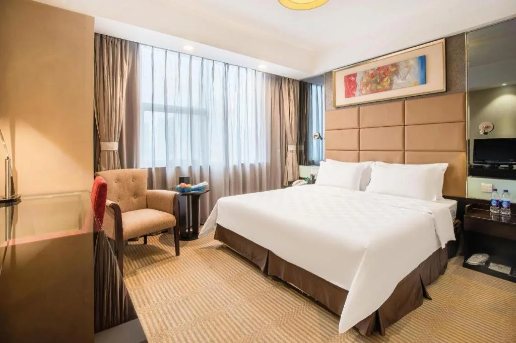 Bed in Zibo Blue Horizon International Hotel