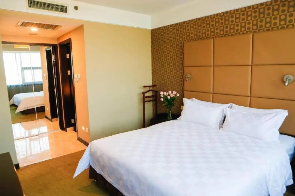 Bed in Zibo Blue Horizon International Hotel