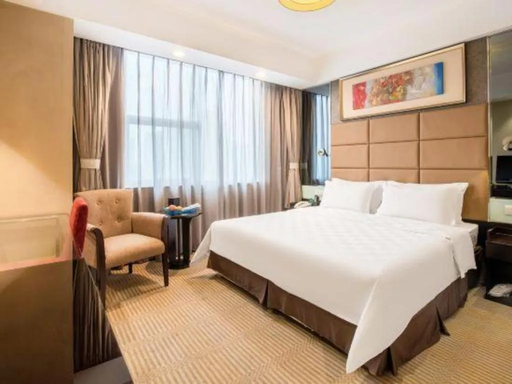 Bed in Zibo Blue Horizon International Hotel