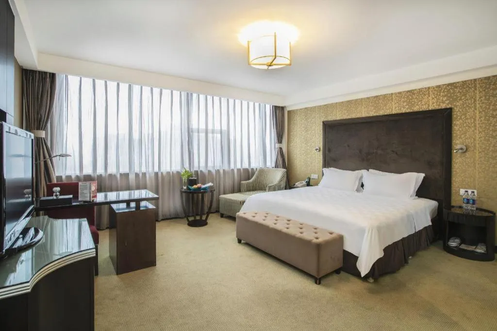 Bed in Zibo Blue Horizon International Hotel