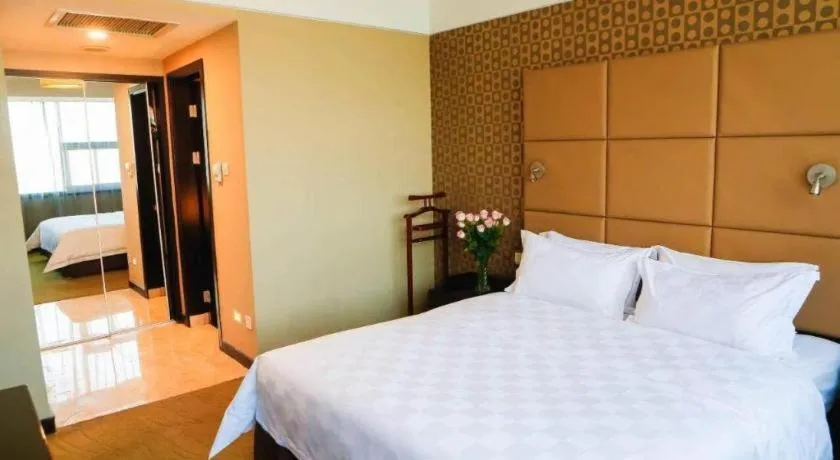 Bed in Zibo Blue Horizon International Hotel