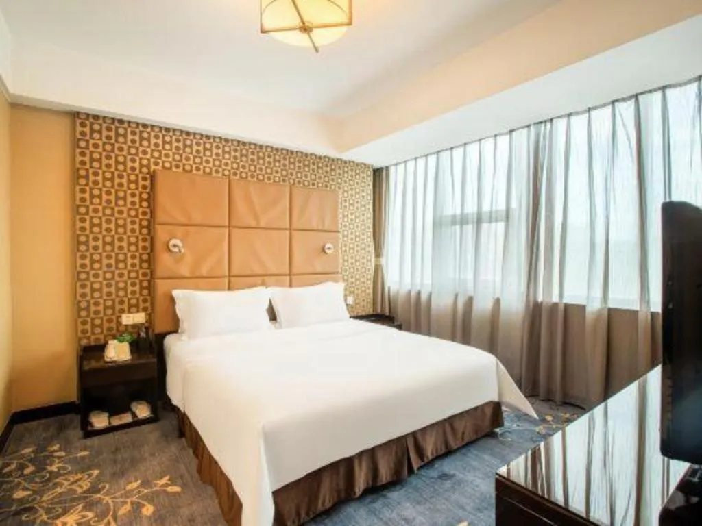 Bed in Zibo Blue Horizon International Hotel