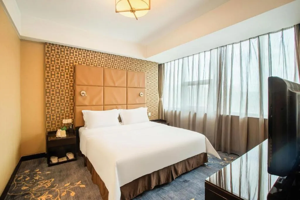 Bed in Zibo Blue Horizon International Hotel