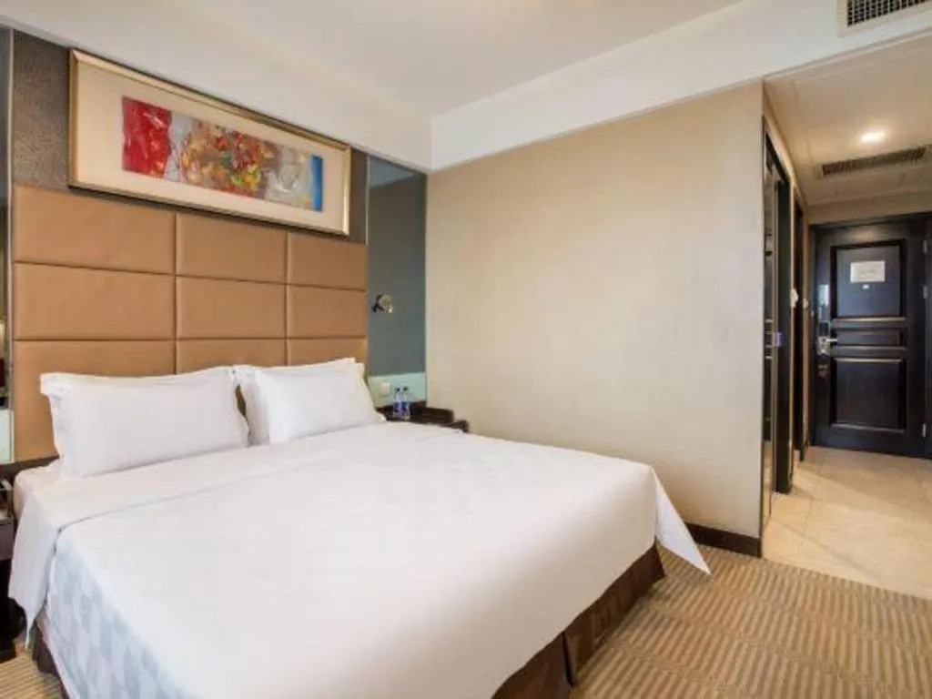 Bed in Zibo Blue Horizon International Hotel