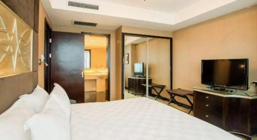 Bed in Zibo Blue Horizon International Hotel