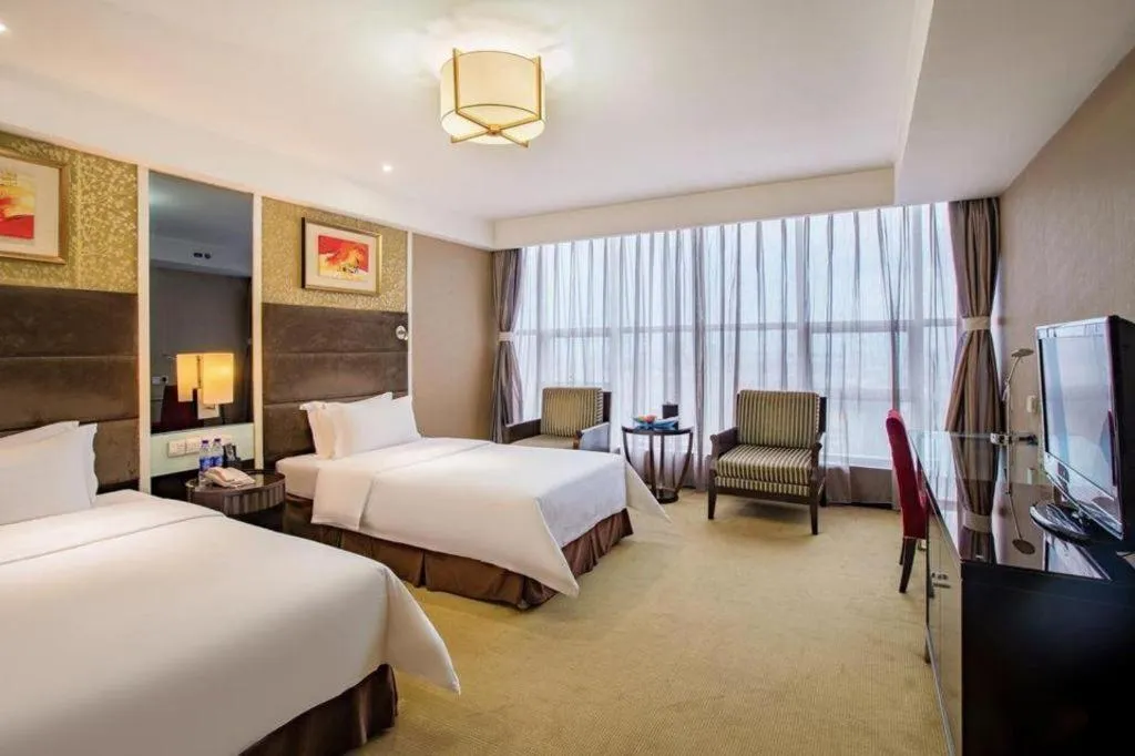 Bed in Zibo Blue Horizon International Hotel