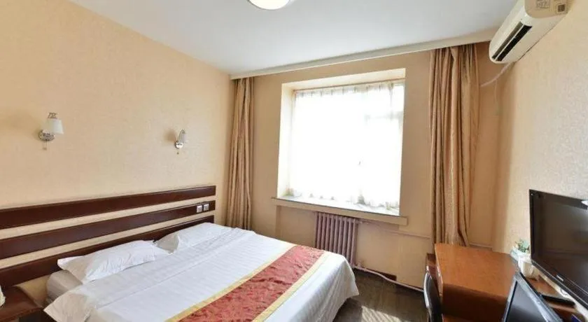 Bed in Super 8 Hotel Beijing International Exhibition Center