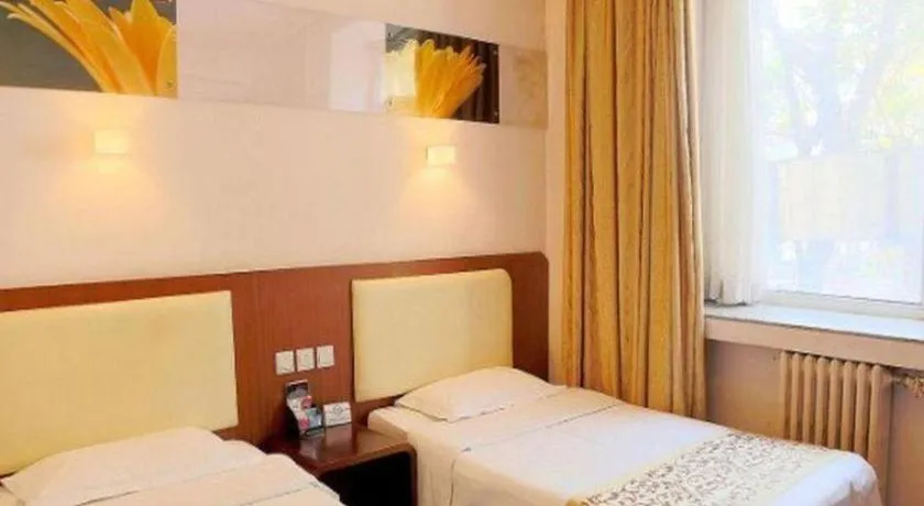 Bed in Super 8 Hotel Beijing International Exhibition Center