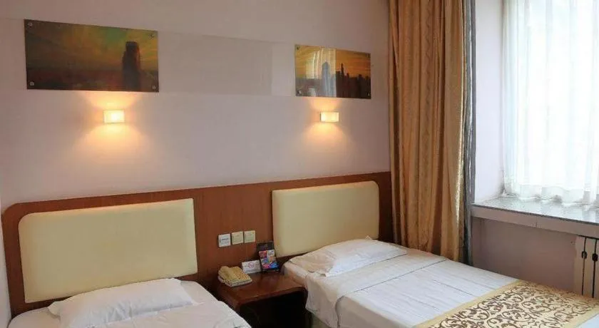 Bed in Super 8 Hotel Beijing International Exhibition Center